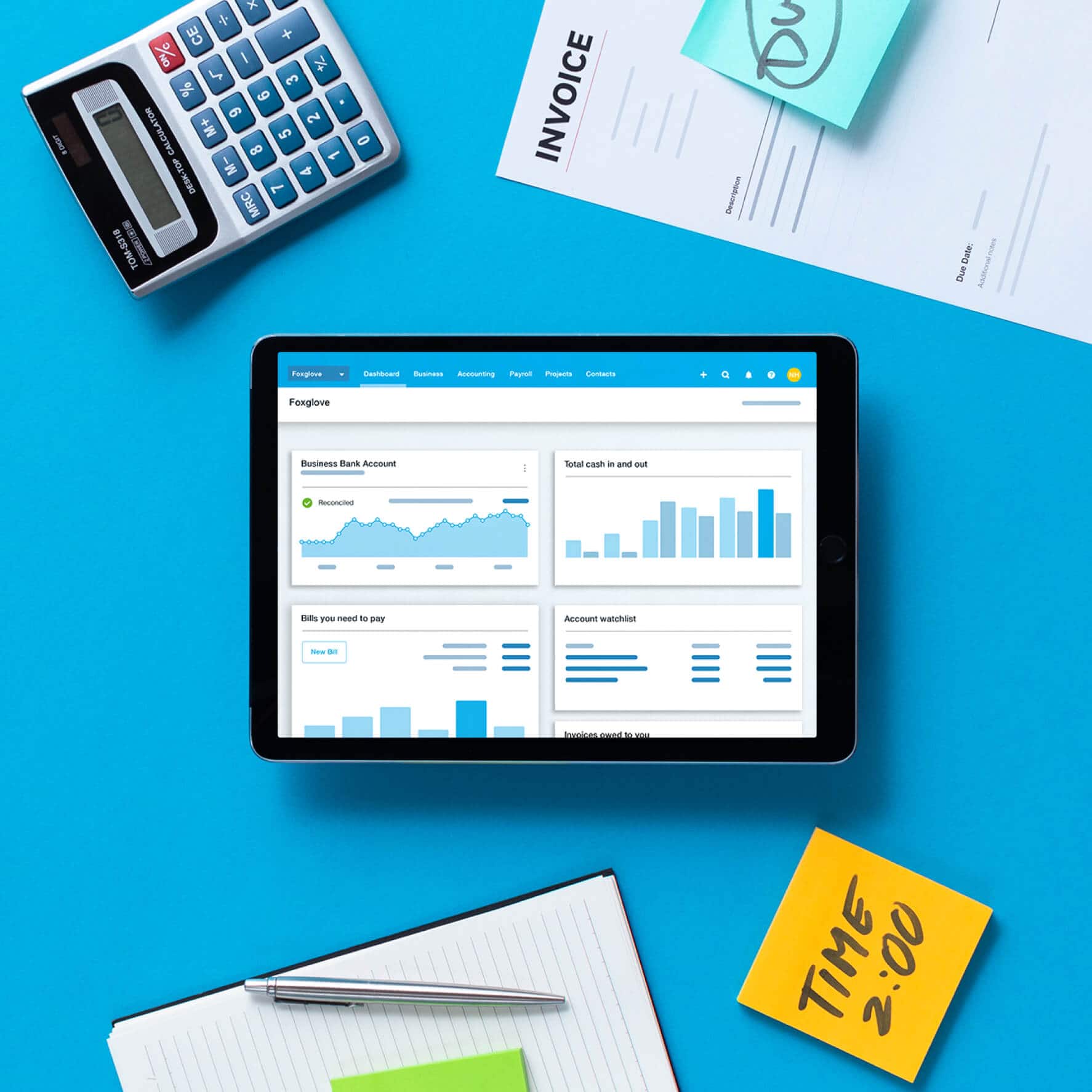 A tablet showing Xero's user interface with paper documents around it.